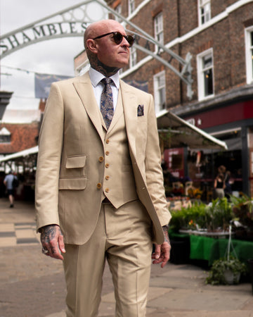 Dress to Impress: Why Every Man Needs a Custom Suit