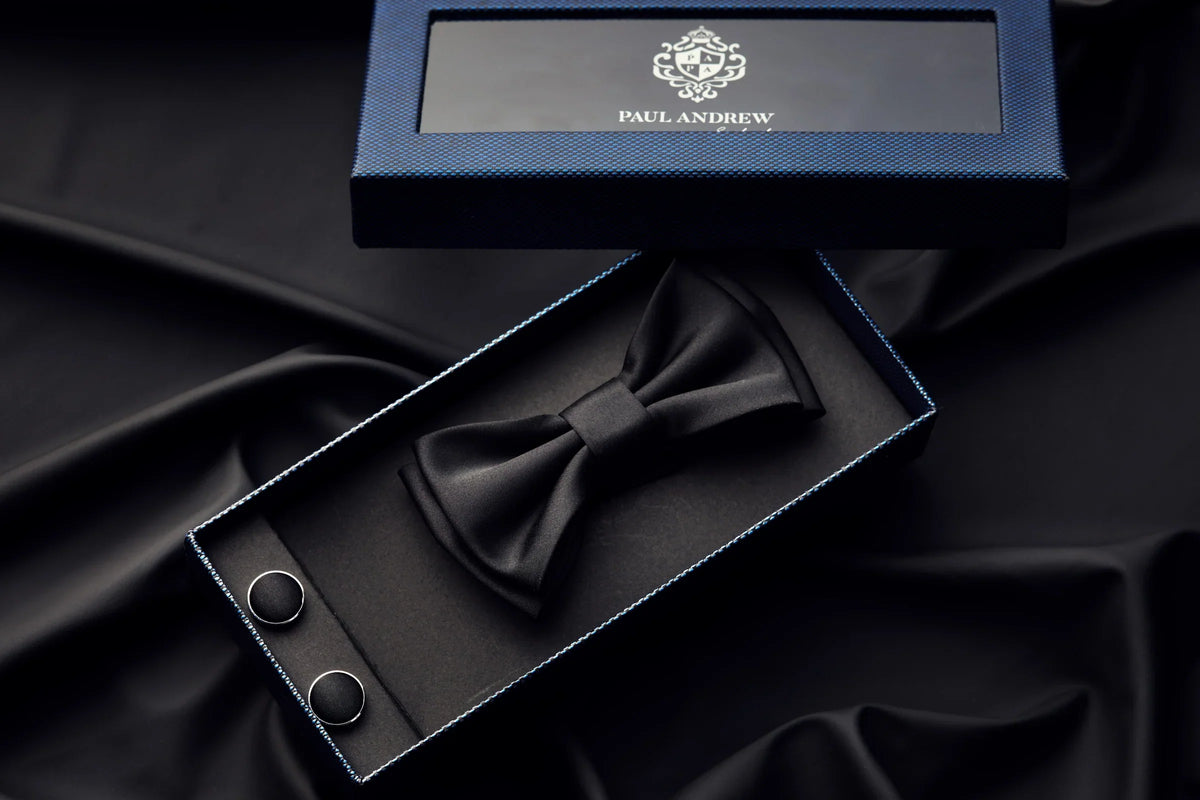 Black Paul Andrew bow tie set featuring a classic, elegant tie for formal occasions, made by the designer Paul Andrew.