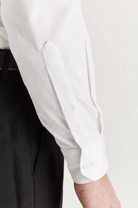 Paul Andrew Oliver white cutaway collar shirt, tailored fit with crisp fabric and classic style, shown on a model.