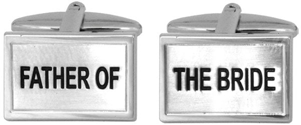 Paul Andrew Father of the Bride cufflinks attached to a formal tie, featuring elegant design suitable for wedding attire.